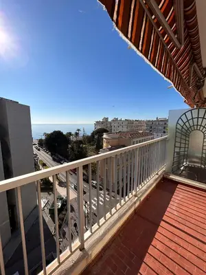 a balcony with a view of the ocean at Appartamento con vista Promenade in Nice