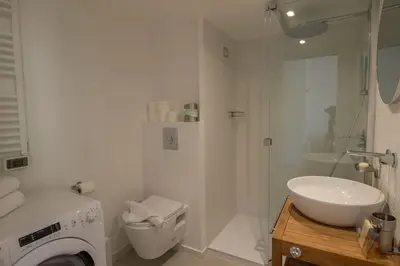 a bathroom with a toilet and a sink and a shower at Charming studio mezzanine w/ large terrace - Nice in Nice