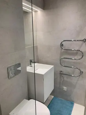 a bathroom with a shower with a toilet and a sink at T2 Carré D'Or in Nice