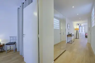 a hallway with a glass door in a room at Maison Bianchi - Saint Philippe in Nice