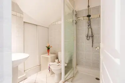 a bathroom with a toilet and a shower at LE FLORIDA AP4340 By Riviera Holiday Homes in Villefranche-sur-Mer