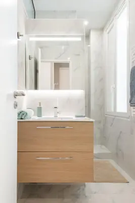 a bathroom with a sink and a mirror at Modern Apartment - Promenade des Anglais in Nice in Nice