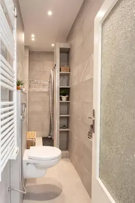 a small bathroom with a toilet and a shower at L6 2Rooms 2mins walk from Negresco & Sea AC-Wifi in Nice