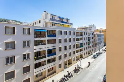 an apartment building with a street in front of it at L12 Port window 1Bedroom Wifi 5mins beach & Nice's Cap in Nice