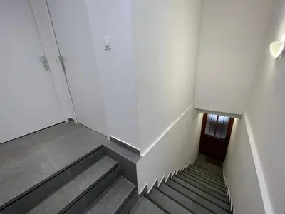 a staircase in a building with a stair case at La cour du centre Nice Verde in Nice