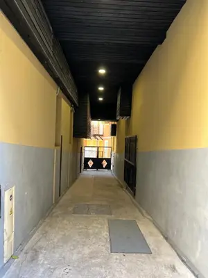 an empty hallway of a building with a ceiling at La cour du centre Nice Verde in Nice