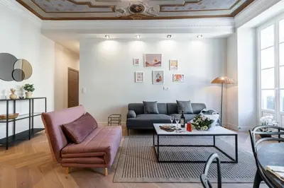 a living room with a couch and a table at MY CASA - PHILIBERT - Traditional Apart with Historical Fresc in Nice