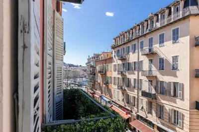 a view from a window of an apartment building at MY CASA - PHILIBERT - Traditional Apart with Historical Fresc in Nice