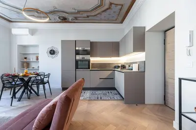 a kitchen and dining room with a coffered ceiling at MY CASA - PHILIBERT - Traditional Apart with Historical Fresc in Nice