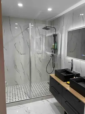 a bathroom with a shower and a sink at Superbe appartement carré Delfino Port de Nice in Nice