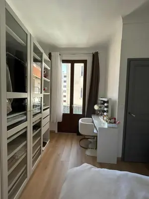 a bedroom with a bed and a desk and a tv at Nice - Appartement T3 rénové de 50 M2 classé 2 étoiles in Nice
